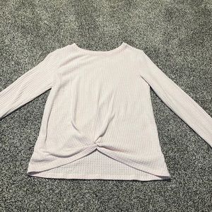 Long sleeve pink Cat & Jack shirt with knot at the bottom.